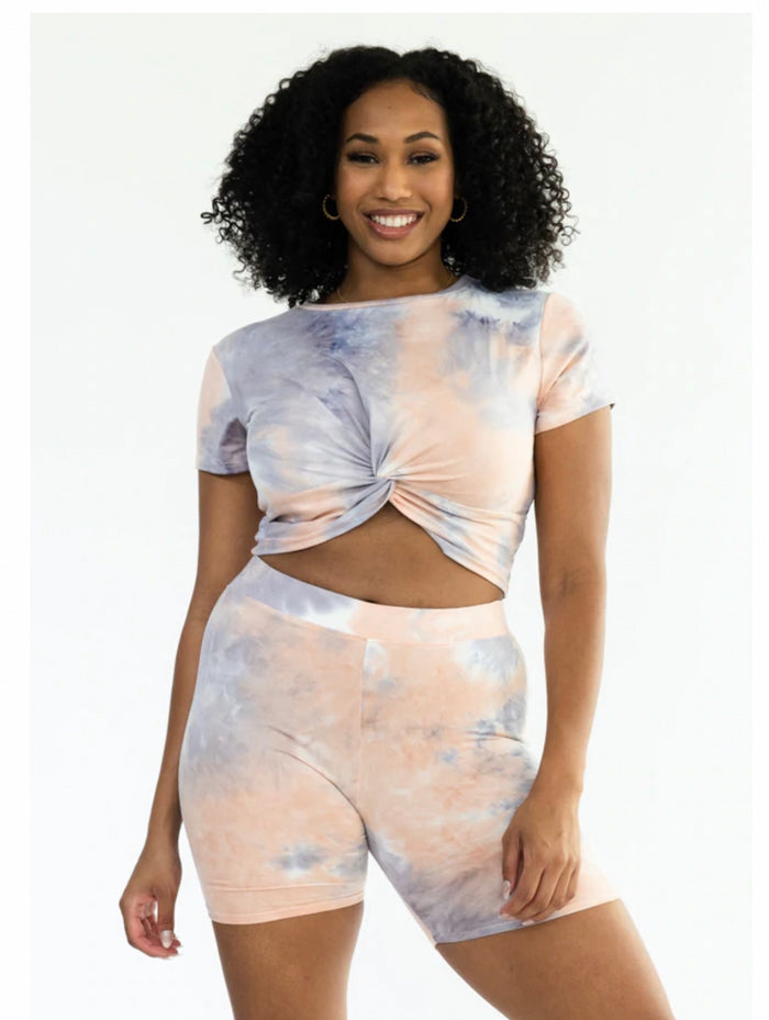 Knot crop top and biker shorts set for women - trendy and comfortable activewear for workouts and outdoor activities.