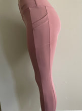 Load image into Gallery viewer, Left side of mauve leggings with pocket for women - high-performance and comfortable activewear for intense workouts and outdoor activities.
