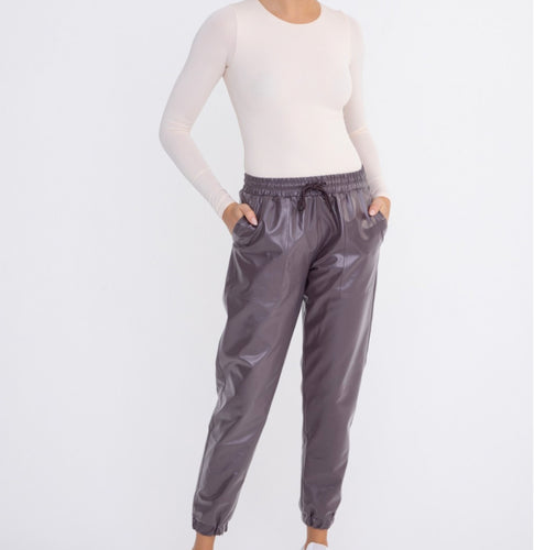 Coffee leather-like high-waisted joggers for women - stylish and comfortable activewear for workouts and everyday wear.