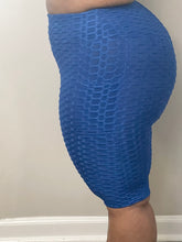 Load image into Gallery viewer, Blue bubble shorts with pocket for women - versatile and comfortable activewear for workouts and everyday wear.
