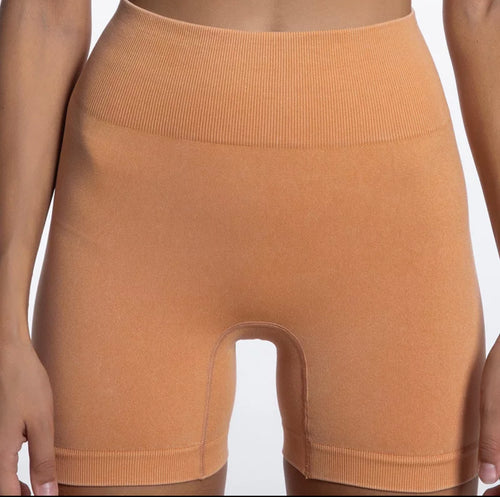 Orange seamless acid-washed yoga shorts for women - perfect for yoga, running, and other workouts.